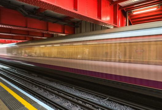 Motion blur of moving train of metro in London, UK.
