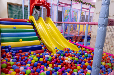 kid indoor play area with slider and other adventure option at evening