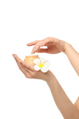 Hands reach for a floral cream jar, isolated on white, PNG