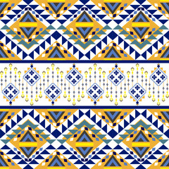 Blue and yellow tribal vector ornament. African pattern. Ethnic carpet with chevrons. Aztec style. Geometric mosaic on the tile, majolica. Ancient interior. Rugs Geo print on textile. Kente Cloth.