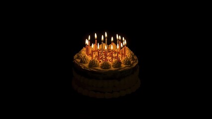 A celebratory birthday cake glows in the dark with a single burning candle's warm light