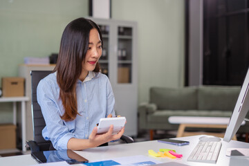 Business women are calculating daily expenses.
