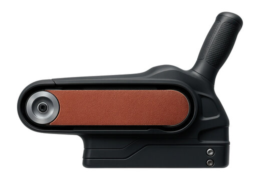 Belt sander with a ceramic-coated belt for prolonged use in a carpentry workshop.