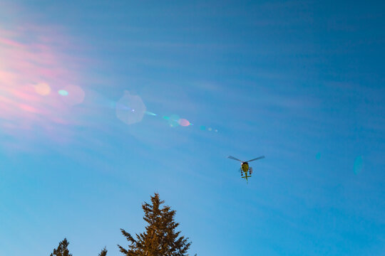 Search and rescue helicopter over the North Cascades range, Washington