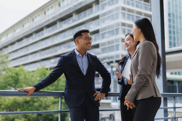 Business colleagues enjoying a conversation outside the office