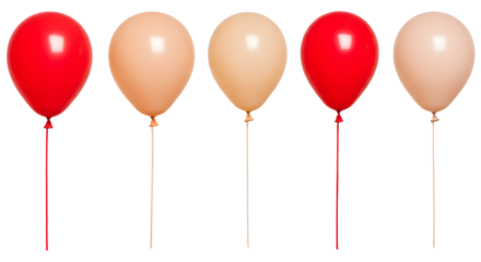 A vibrant display of red and beige balloons lined up, adding festive cheer to a celebration, with a blurred background hinting at a party atmosphere