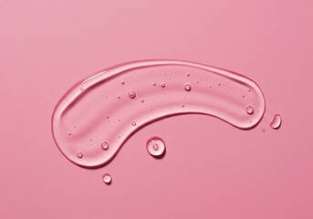 Abstract pink backdrop with clear gel smear overhead texture for cosmetic or science use