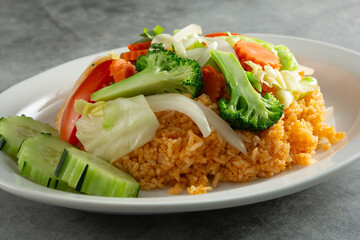 A view of a vegetable fried rice entree.