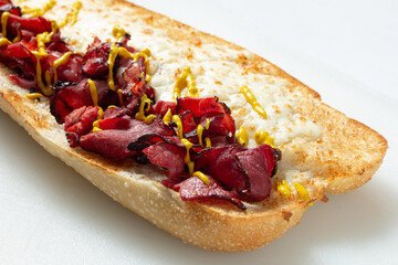 A view of a pastrami sandwich.