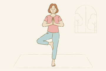 A woman doing tree pose yoga and calm mind practice, sport healthy life concept