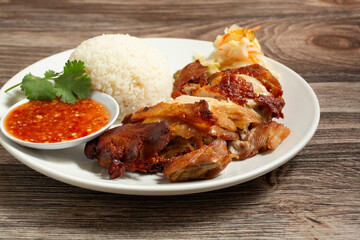 A view of an entree of Hainanese fried chicken.