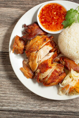 A top down view of an entree of Hainanese fried chicken.