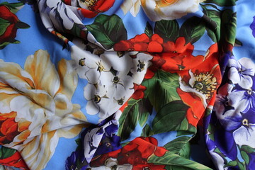 Soft folds on bright and colorful thin rayon fabric