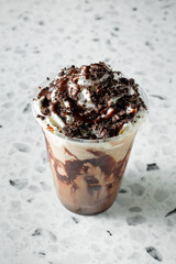 A view of a cookies and cream coffee drink.