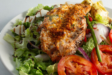 A closeup view of a salmon salad.