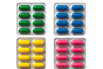 Colorful blister packs of medical capsules in green blue yellow and pink isolated on transparent background