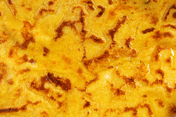 A top down view of a makki ki roti, as a background.