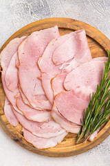 Prosciutto Cotto, Sliced Pork Ham on wooden board. white background. top view