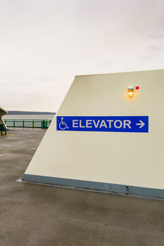 ADA (Americans with Disabilities Act) wheelchair sign for Elevator for disabled passengers on the upper deck of the ferry out of Edmonds.