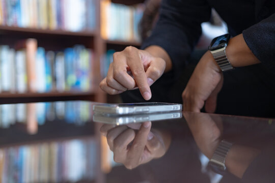 Social media and digital online concept, man using smart phone. The concept of living on vacation and playing social media. Social Distancing ,Working From Home