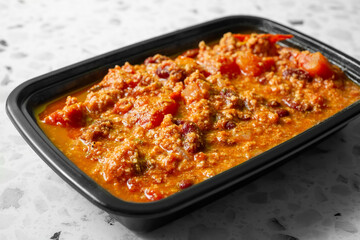 A view of a meal prep container of turkey chili.