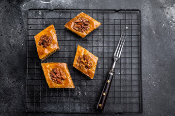 Traditional Honey Walnut Baklava. black background. top view