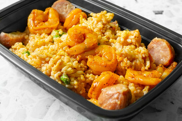 A view of a shrimp fried rice meal prep entree.