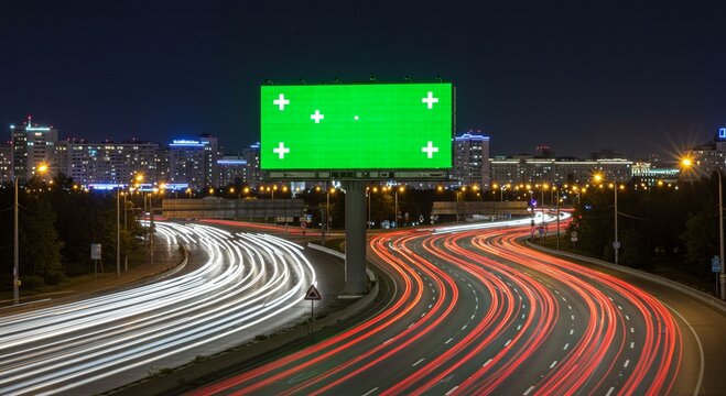 Blank green billboard highway night