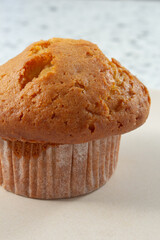 A closeup view of a banana nut muffin.
