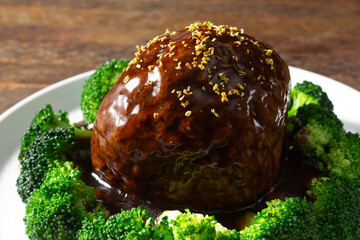 A view of an entree called Lion's head meatball.