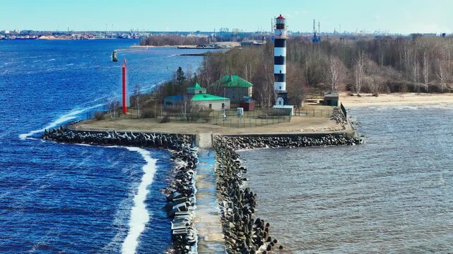Flying Towards Daugavgrivas Baka Lighthouse In Daugavgrīva On The Bay Of Riga In Latvia. Aerial Shot