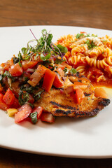 A view of a grilled salmon entree.