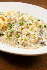 A closeup view of a plate of tortelloni.