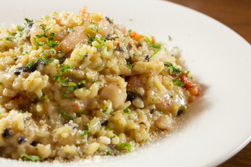 A view of a seafood risotto entree.
