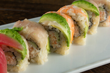 A closeup view of a rainbow roll. © DAVID