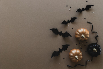 Halloween party decorations frame from pumpkins, bats top view. Happy halloween holiday greeting card flat lay style.