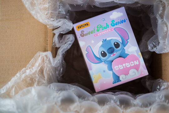 Bangkok, Thailand - July 17, 2025 : Box of figure Stitch. Character from the movie Lilo and Stitch. 52TOYS.
