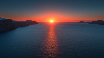 Fototapeta premium Sunset over the sea with sun rays reflecting on the water, tranquility and beauty of nature. Travel, recreation, nature. In topics related to travel, recreation and nature, 