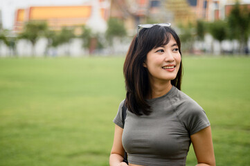 Happy solo southeast asian woman teenager blogger enjoying world travel tourism concept. local...