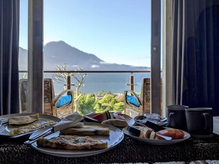 Luxury Hotel Breakfast with a Spectacular View of a Volcanic Lake