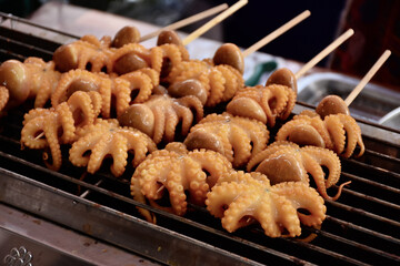 Grilled octopus on charcoal stove, Grilled squid on skewers, Barbecue (BBQ) squid, Favourite...