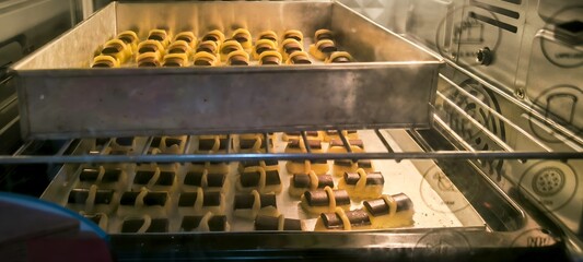 Homemade Cookies with Chocolate Baking in the Oven