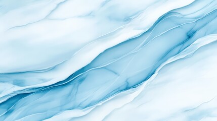 Obraz premium A beautiful blue marble texture with soft, flowing lines, ideal for backgrounds, website design, or product presentations, It brings a calm and elegant feel to any project,