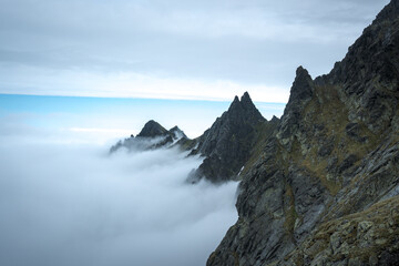 Mountain peak above the clouds, mountain landscape.

