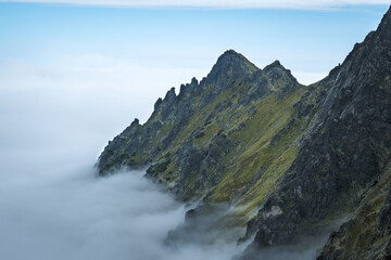 Mountain peak above the clouds, mountain landscape.
