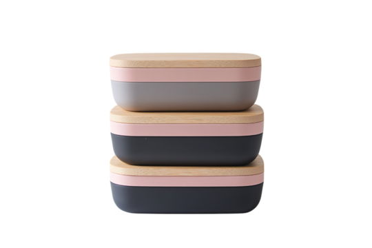A stack of three lunch boxes, each with a different color and texture the colors include shades like blush pink, charcoal grey, light brown, and a isolated on a transparent background in PNG format.