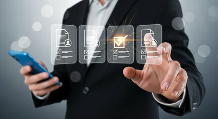 Businessman using a digital interface on his smartphone and touching a screen