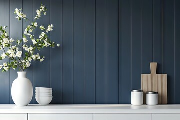 White vase with flowers and bowls on a white countertop against a dark blue wall.