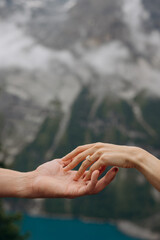 hands of the man and woman