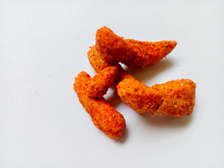 'Basreng' is a fried meatball with a spicy taste isolated on white background.